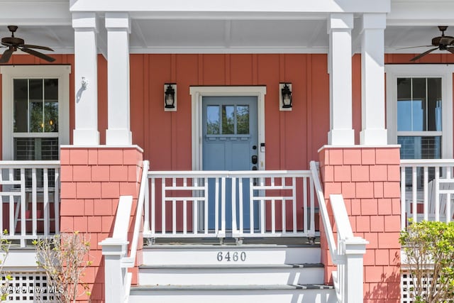 6460 Carrick Bend Trl SW, Ocean Isle Beach, NC 28469 - property entrance featuring a ceiling fan, covered porch, and board and batten siding