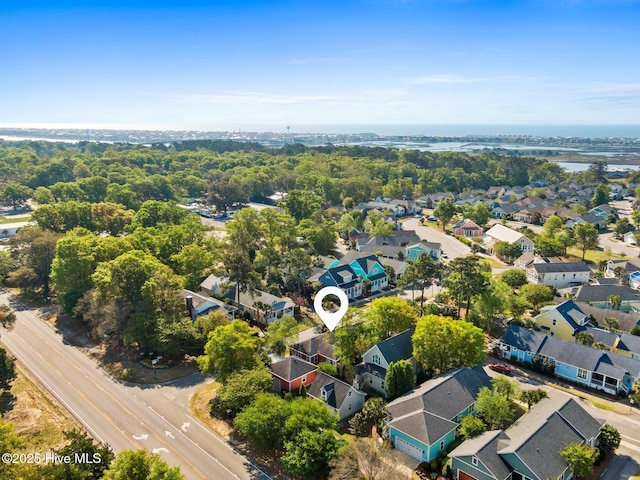 6460 Carrick Bend Trl SW, Ocean Isle Beach, NC 28469 - aerial perspective of suburban area featuring a nearby body of water