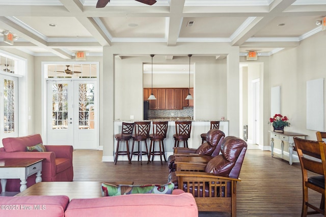 6460 Carrick Bend Trl SW, Ocean Isle Beach, NC 28469 - living room with dark wood-style flooring, crown molding, coffered ceiling, and a ceiling fan