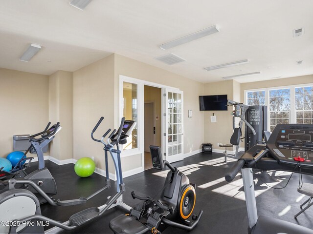 6460 Carrick Bend Trl SW, Ocean Isle Beach, NC 28469 - workout area with baseboards and french doors
