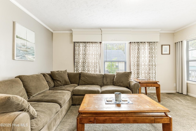 carpeted living room featuring ornamental molding and baseboards