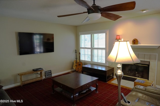 10 Flint Ct Unit 12, Pinehurst, NC 28374 - living area featuring a ceiling fan, a tile fireplace, and baseboards