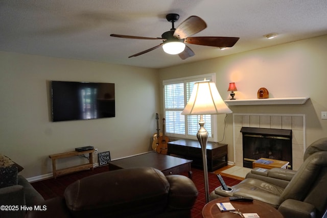 10 Flint Ct Unit 12, Pinehurst, NC 28374 - living area with a ceiling fan, a tile fireplace, and baseboards