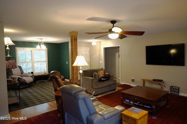 10 Flint Ct Unit 12, Pinehurst, NC 28374 - living room featuring a chandelier, wood finished floors, ceiling fan, and baseboards
