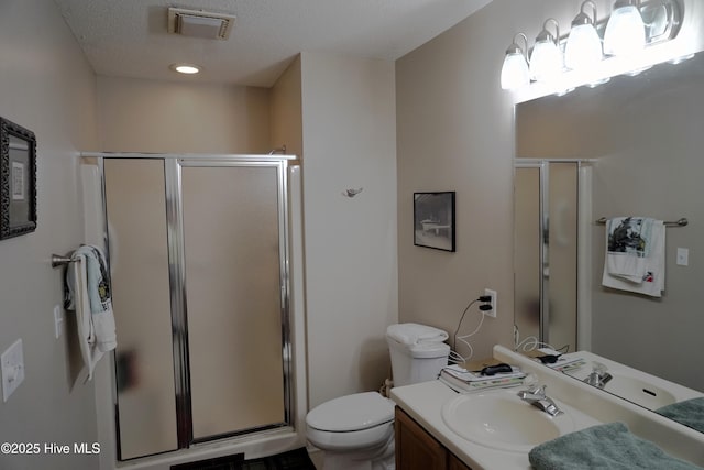 10 Flint Ct Unit 12, Pinehurst, NC 28374 - full bathroom featuring vanity, a shower stall, and toilet