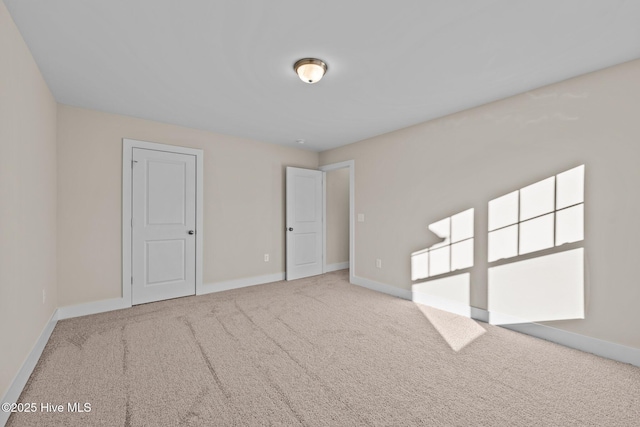 806 Pryor St Unit 50, Mebane, NC 27302 - carpeted spare room with baseboards