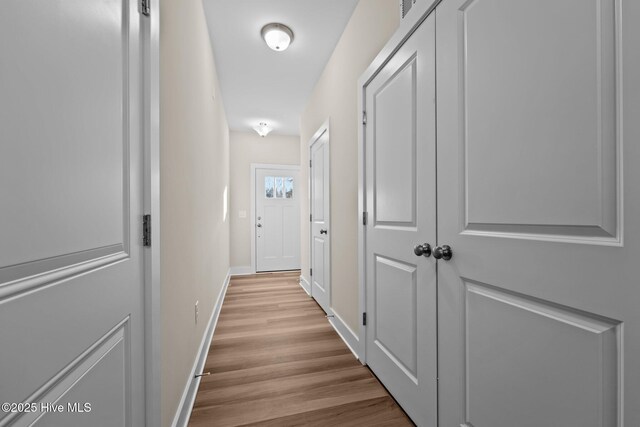 806 Pryor St Unit 50, Mebane, NC 27302 - hallway featuring baseboards and wood finished floors