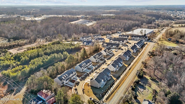 806 Pryor St Unit 50, Mebane, NC 27302 - drone / aerial view featuring a wooded view