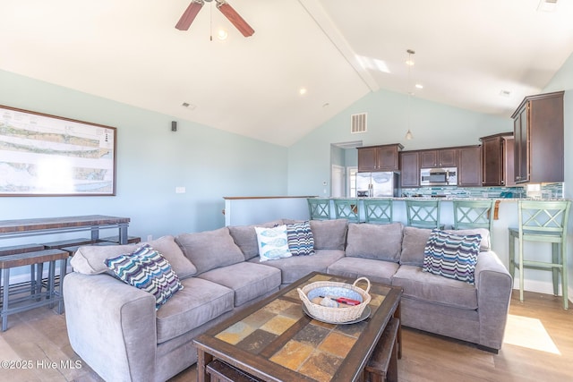 210 Gysgt Dw Boatman Dr Unit 1, North Topsail Beach, NC 28460 - living room featuring ceiling fan, light wood-style flooring, and high vaulted ceiling