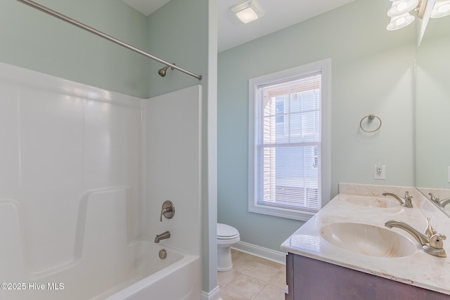 210 Gysgt Dw Boatman Dr Unit 1, North Topsail Beach, NC 28460 - full bathroom with toilet, tile patterned flooring, baseboards, double vanity, and bathing tub / shower combination