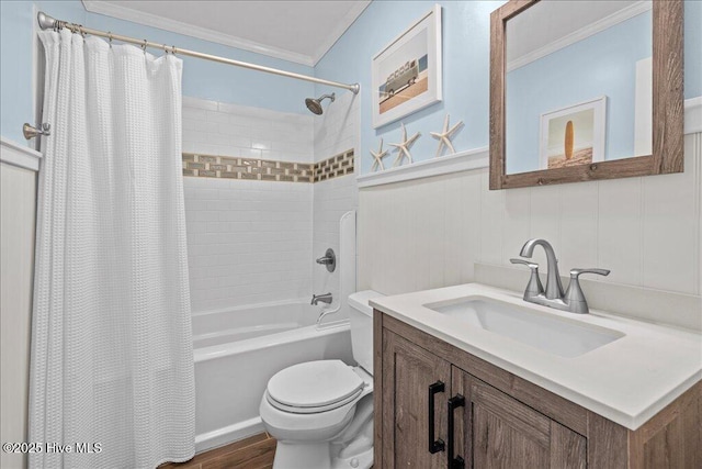 bathroom with toilet, crown molding, shower / tub combo with curtain, wood finished floors, and wainscoting