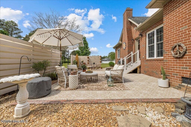 view of patio with fence