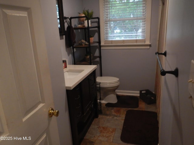 1714 Dillahunt St, New Bern, NC 28560 - bathroom with vanity and stone finish floors