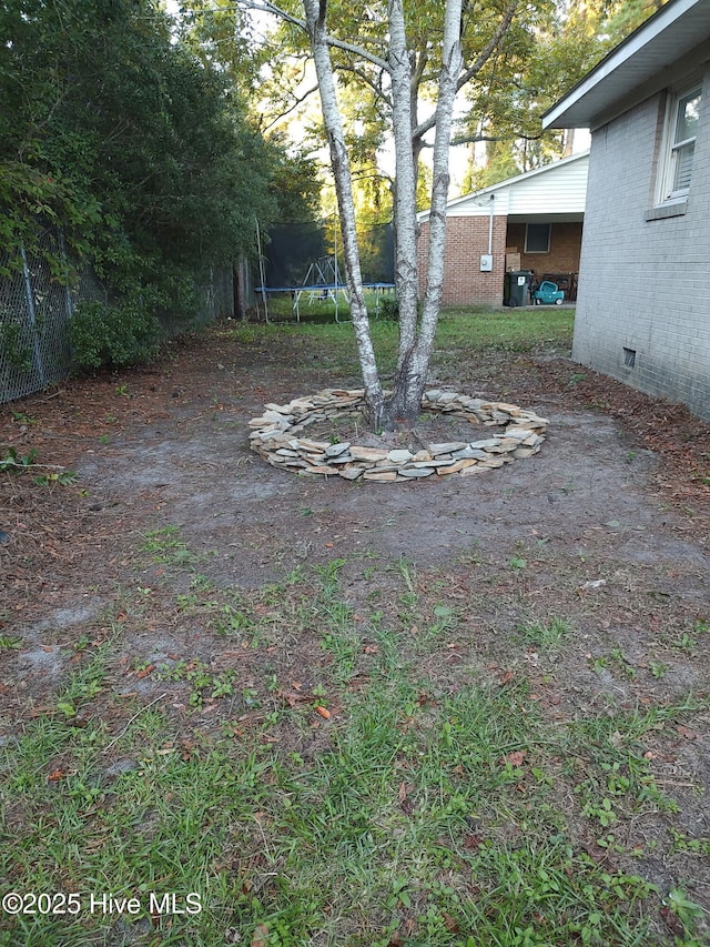 1714 Dillahunt St, New Bern, NC 28560 - view of yard with a trampoline