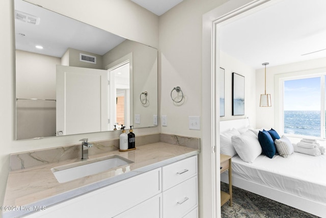 ensuite bathroom with vanity