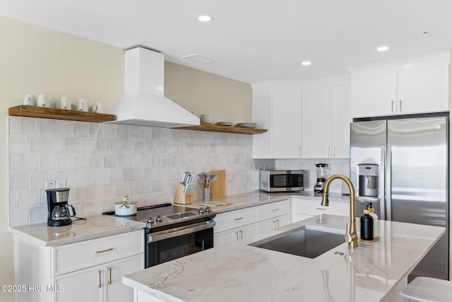 kitchen featuring open shelves, stainless steel appliances, range hood, a sink, and recessed lighting