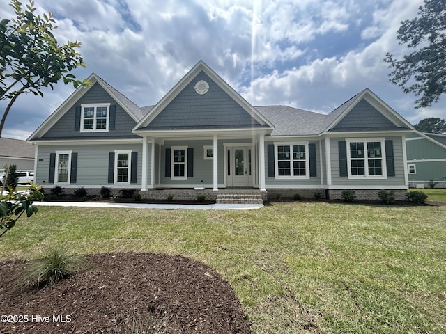 view of front of home with a front lawn and a porch