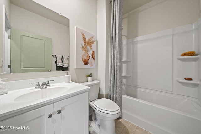 bathroom featuring toilet, vanity, and shower / bath combo with shower curtain