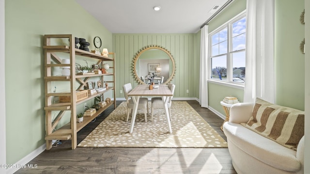office space with wood finished floors and baseboards