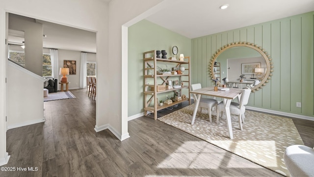 office space featuring baseboards and wood finished floors