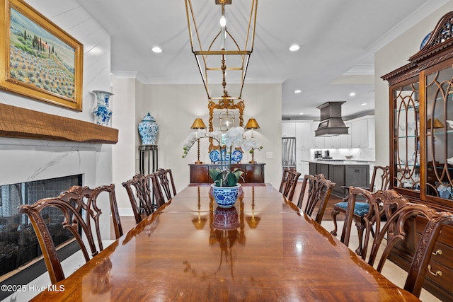 100 Holly Springs Ct, Southern Pines, NC 28387 - dining area featuring crown molding, a fireplace, and recessed lighting
