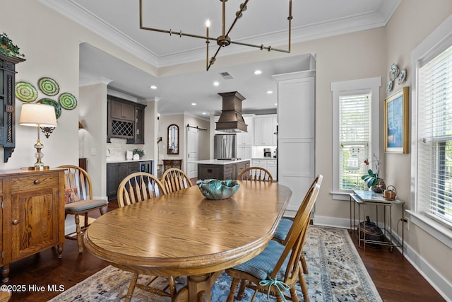 100 Holly Springs Ct, Southern Pines, NC 28387 - dining area featuring a notable chandelier, baseboards, ornamental molding, visible vents, and dark wood-type flooring