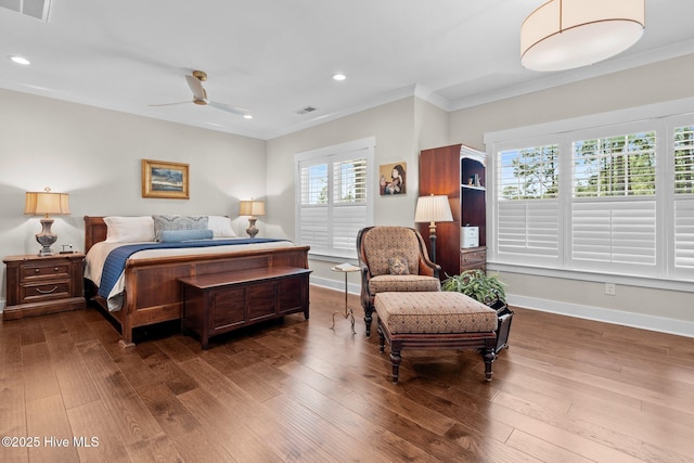 100 Holly Springs Ct, Southern Pines, NC 28387 - bedroom featuring dark wood-style flooring, crown molding, visible vents, and baseboards