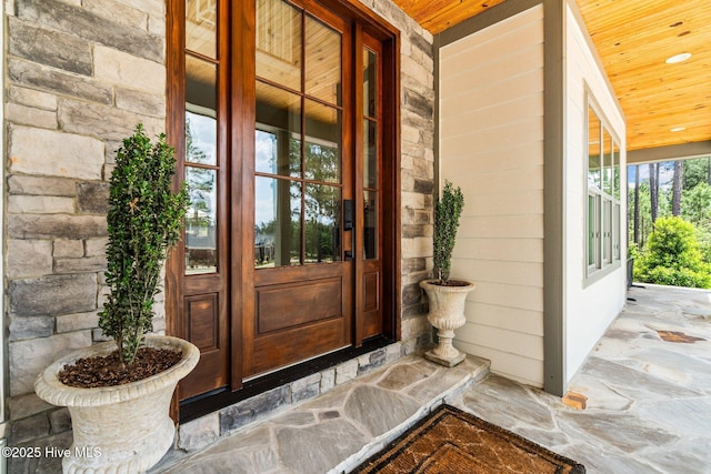 100 Holly Springs Ct, Southern Pines, NC 28387 - entrance to property featuring stone siding and covered porch