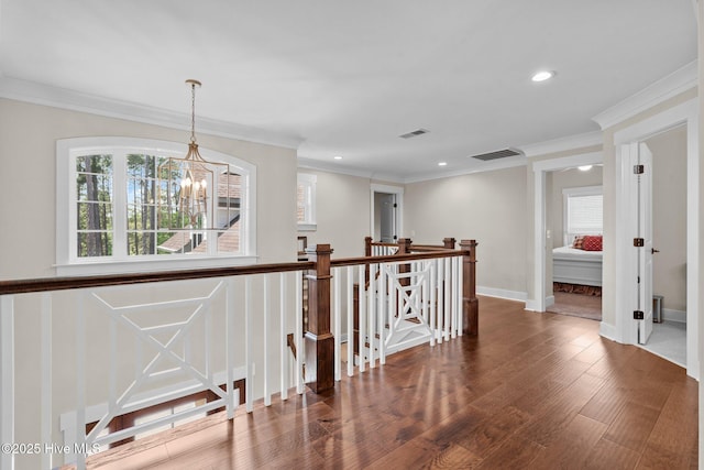 100 Holly Springs Ct, Southern Pines, NC 28387 - hall with a wealth of natural light, visible vents, and an upstairs landing
