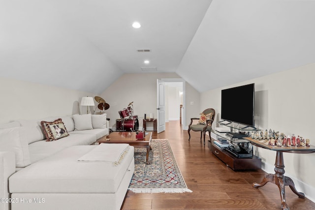 100 Holly Springs Ct, Southern Pines, NC 28387 - living room with recessed lighting, baseboards, visible vents, vaulted ceiling, and wood finished floors