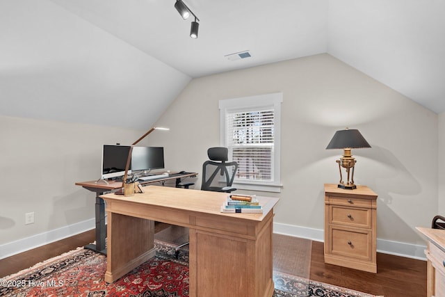 100 Holly Springs Ct, Southern Pines, NC 28387 - office area with vaulted ceiling, dark wood-style flooring, baseboards, and visible vents
