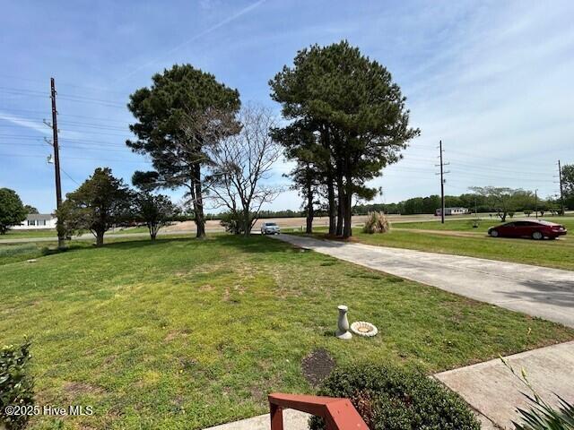 837 Simpson Ditch Rd, Elizabeth City, NC 27909 - wooden terrace with a lawn