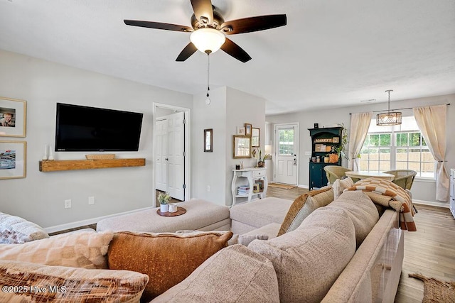 197 Cherry Rd, Southport, NC 28461 - living room featuring wood finished floors, ceiling fan, and baseboards