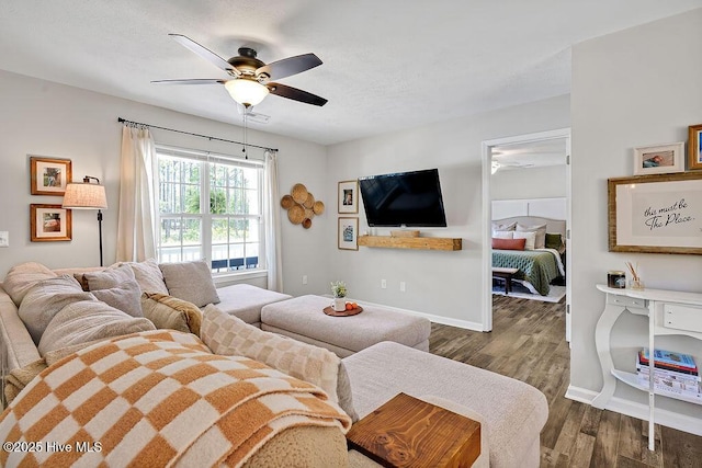 197 Cherry Rd, Southport, NC 28461 - living area with ceiling fan, dark wood-style floors, and baseboards