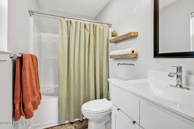 197 Cherry Rd, Southport, NC 28461 - bathroom with toilet, vanity, and shower / bathtub combination with curtain