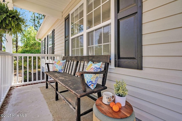 197 Cherry Rd, Southport, NC 28461 - balcony featuring a porch