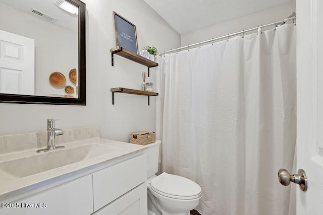 197 Cherry Rd, Southport, NC 28461 - bathroom with toilet and vanity