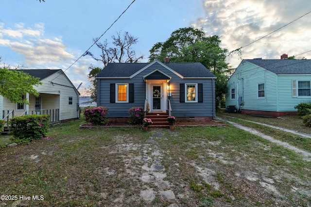 bungalow-style home featuring central AC