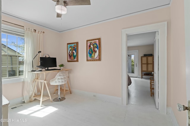 office featuring a ceiling fan, visible vents, and baseboards