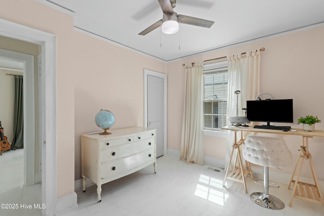 home office featuring ceiling fan, crown molding, visible vents, and baseboards