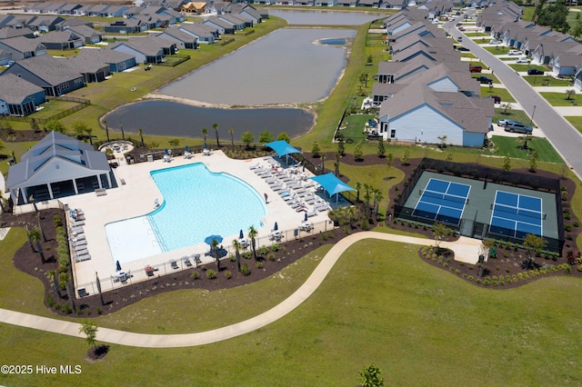 317 Eagle Claw Dr Unit 4033, Carolina Shores, NC 28467 - drone / aerial view of a pool and a large body of water