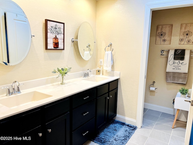 2208 Drawing Ct, Wilmington, NC 28412 - bathroom with double vanity and tile patterned floors