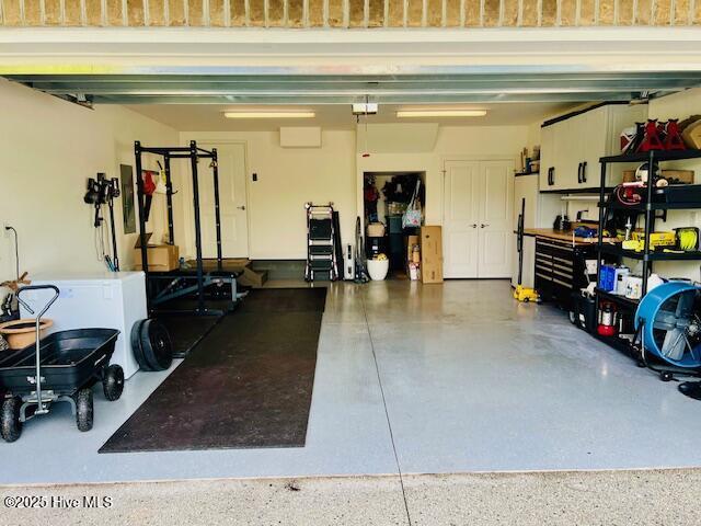 2208 Drawing Ct, Wilmington, NC 28412 - garage featuring fridge and a garage door opener