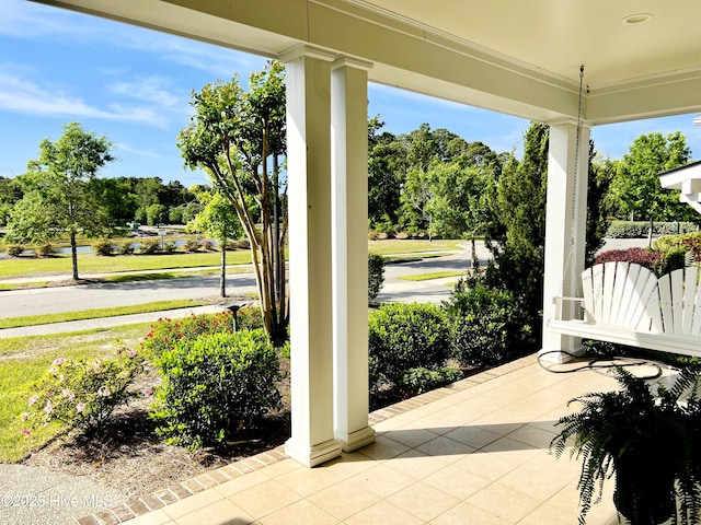 2208 Drawing Ct, Wilmington, NC 28412 - covered porch featuring view of wooded area