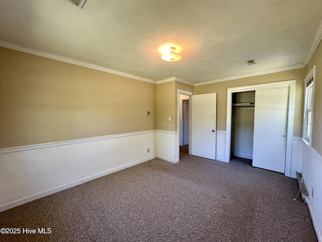 119 Emperor Landing Rd, Edenton, NC 27932 - unfurnished bedroom with ornamental molding, visible vents, a closet, and carpet flooring