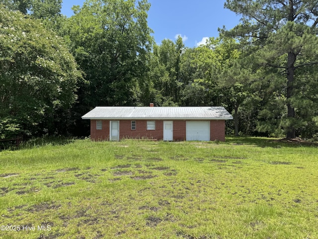 11085 Sam Potts Hwy, Lake Waccamaw, NC 28450 - view of outbuilding with a forest view
