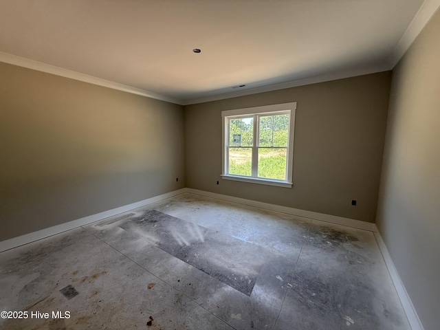 125 Tee Dr, Selma, NC 27576 - spare room featuring baseboards and crown molding