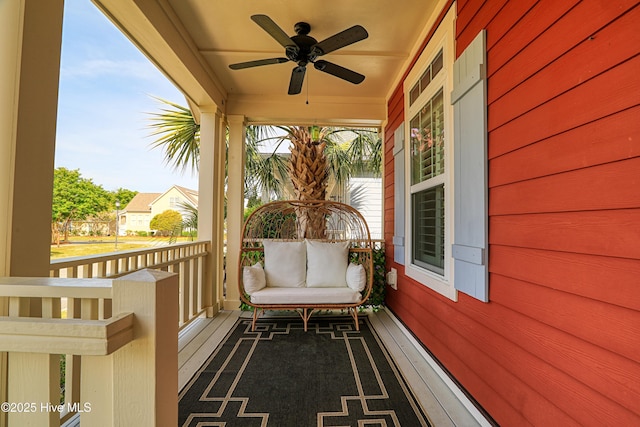 6445 Figure Eight Dr SW, Ocean Isle Beach, NC 28469 - balcony featuring ceiling fan and a porch