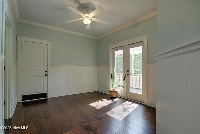 6445 Figure Eight Dr SW, Ocean Isle Beach, NC 28469 - doorway with wainscoting, hardwood / wood-style flooring, ceiling fan, and crown molding