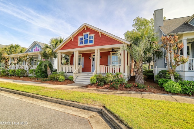 6445 Figure Eight Dr SW, Ocean Isle Beach, NC 28469 - view of front of home with covered porch